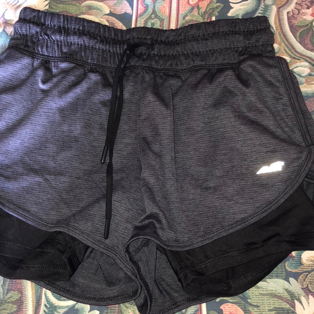 black and grey athletic shorts
